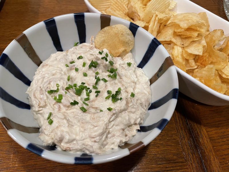 Caramelized onion dip with side of potato chips